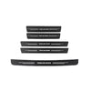 Three black carbon fiber decals or stickers labeled Trailblazer arranged vertically and horizontally.