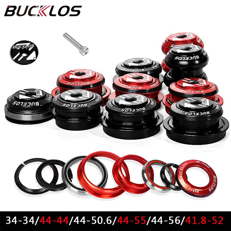 Set of black and red bicycle headset components including cups, stem, and bearing parts