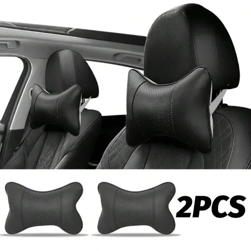 Two black ergonomic auto headrest cushions for neck support