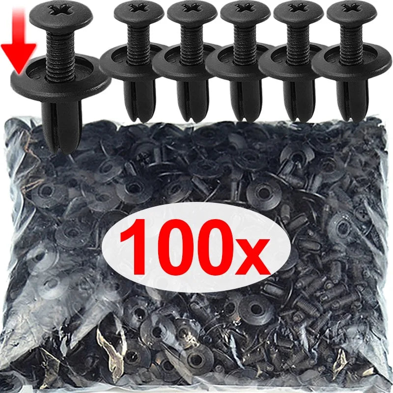 A pile of black plastic rivets and push pins for car bumpers, with a hand showing the size.