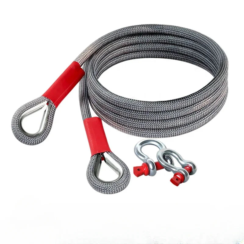 A coiled heavy duty towing rope with red handles and silver metal hooks.