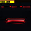 Red LED signal lights for a vehicle rear bumper reflector.