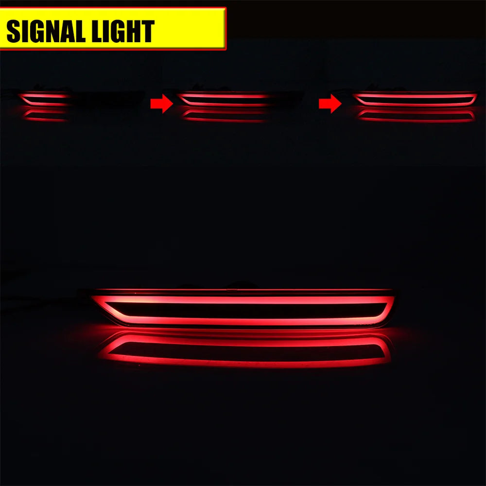 Red LED signal lights for a vehicle rear bumper reflector.