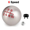 A silver aluminum ball shift knob with red markings showing 6 speed gears and an included hex bolt.