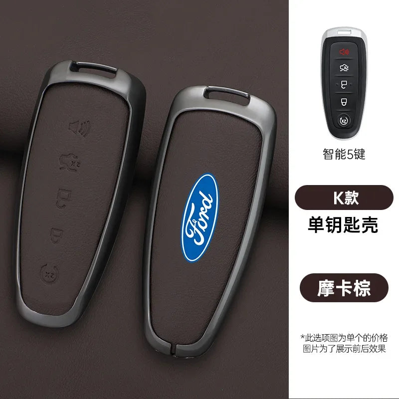 A pair of Ford car key covers in brown leather and silver metal, with a remote control shown separately.