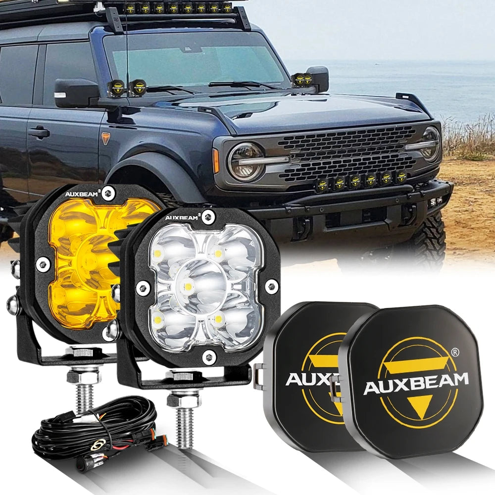 A set of powerful LED off-road driving lights mounted on a truck bumper and separate units.