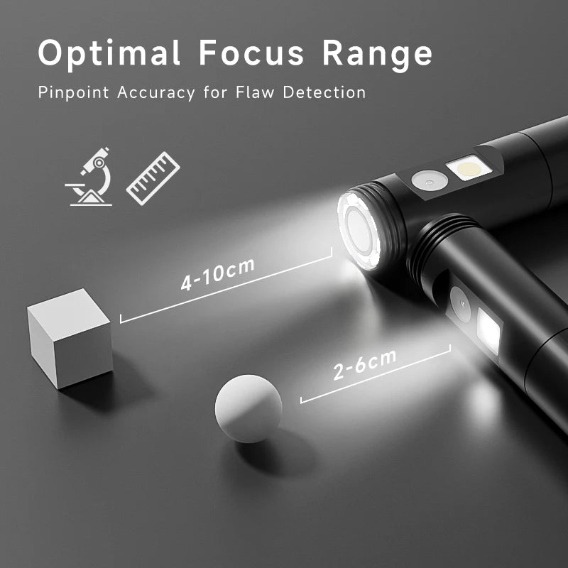 A close-up view of an industrial endoscope probe focusing light onto a small object for flaw detection.