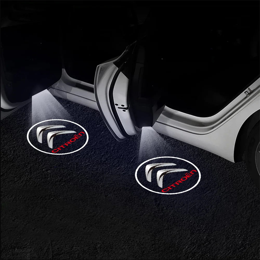 Wireless LED car door welcome light projector with a Citroën logo illuminating the ground.