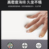 A hand is pressing a section of a memory foam cushion, illustrating the high-density marine grade material's rebound and weig