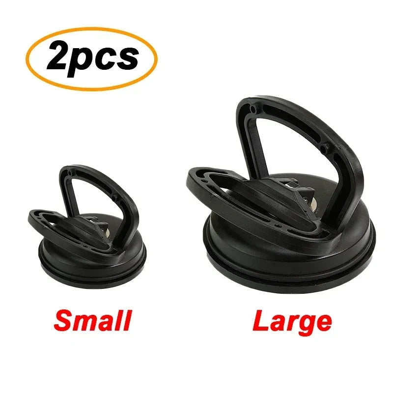 Two car dent glass suction removal tools, small and large versions, shown against a white background.