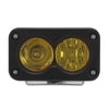 Black LED pod spotlight with dual amber lenses mounted for motorcycle offroad headlights