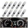A set of T5 LED dashboard and license plate bulbs arranged in a row.
