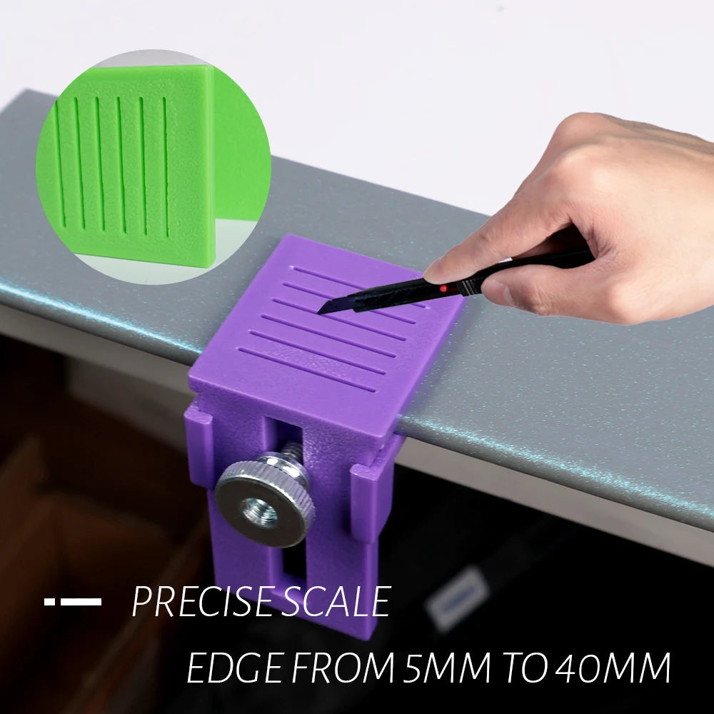 A hand is using a purple precision scale with an edge from 5mm to 40mm to cut vinyl film.
