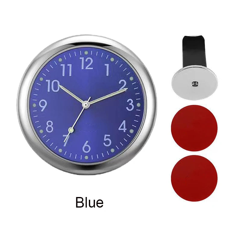 A round blue stick-on car clock with a silver bezel and a black mounting clip.