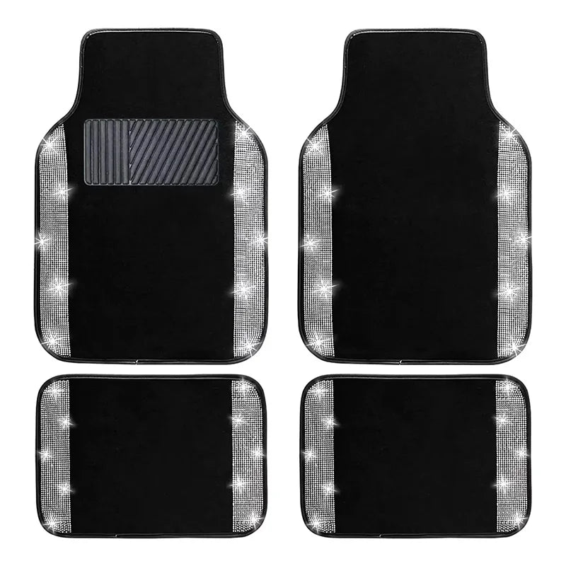 A set of black car floor mats with sparkling diamond accents.