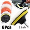 A set of six foam polishing pads for car detailing, including a yellow and black pad.