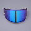 A close-up view of a blue anti-fog visor for a motorcycle helmet with a vertical black stripe.
