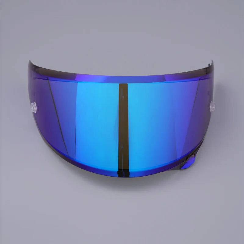 A close-up view of a blue anti-fog visor for a motorcycle helmet with a vertical black stripe.
