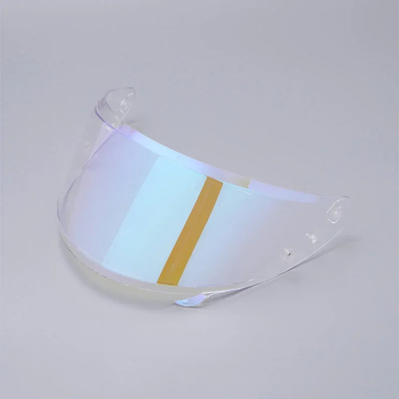A clear anti-fog visor for a motorcycle helmet with a gold stripe visible.