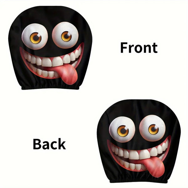 A set of two funny cartoon car headrest covers featuring a big-eyed, tongue-out monster design shown from the front and back.