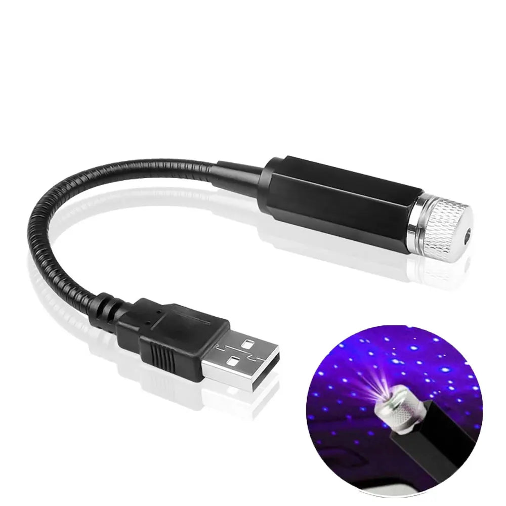 Projecteur ciel étoilé LED noir avec câble flexible et connecteur USB illuminant un motif violet.