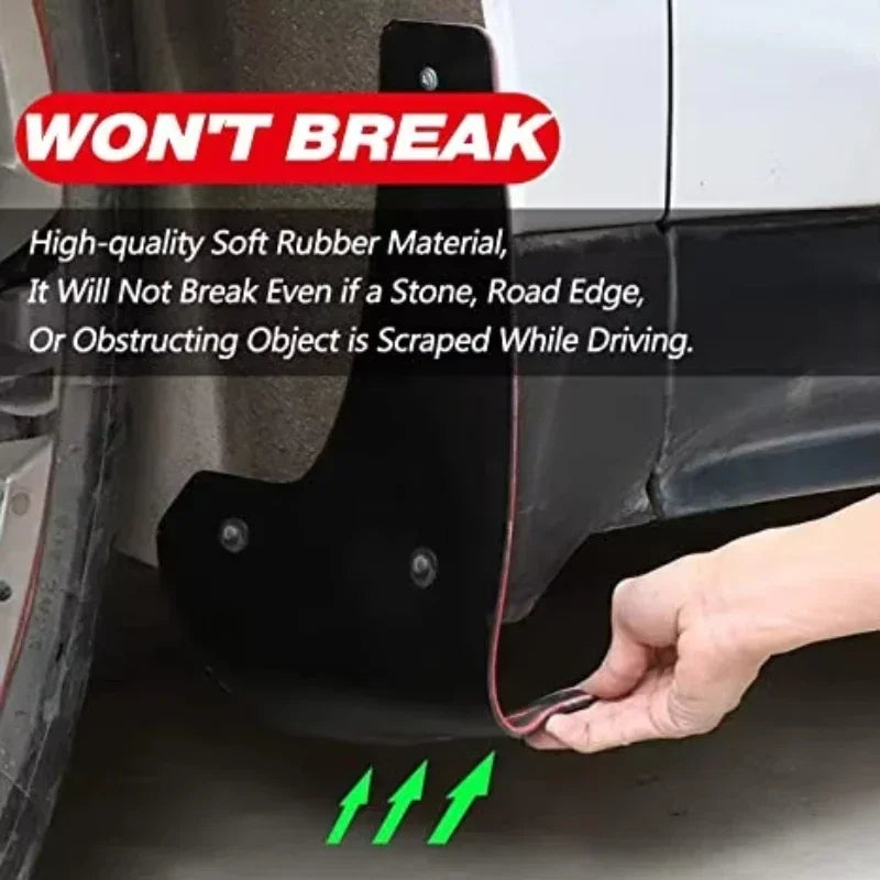 Close-up of a black rubber mud flap installed on a vehicle's fender, showing its flexible material and mounting.