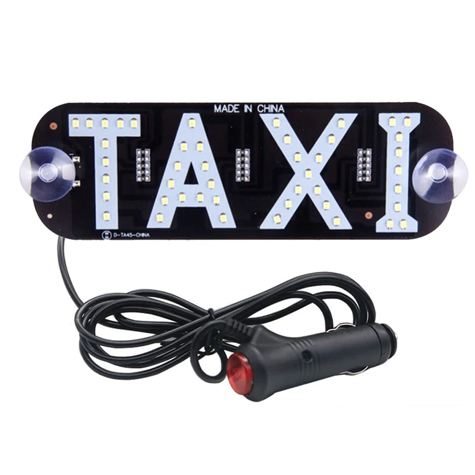 Black LED taxi indicator light featuring the text TAXI in bright white lights, made in China.