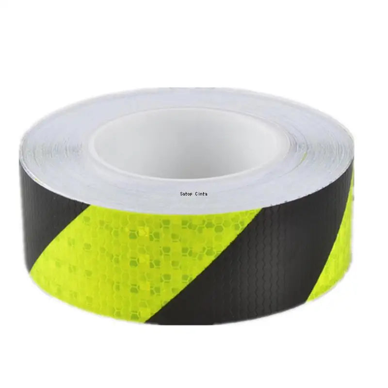 Roll of high-visibility fluorescent reflective safety tape in black and neon yellow.