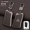 A pair of dark brown leather car key covers for Lexus vehicles, shown in a close-up view.