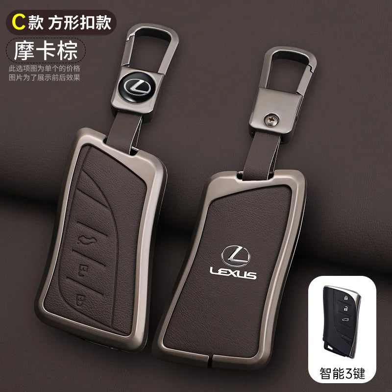 A pair of dark brown leather car key covers for Lexus vehicles, shown in a close-up view.