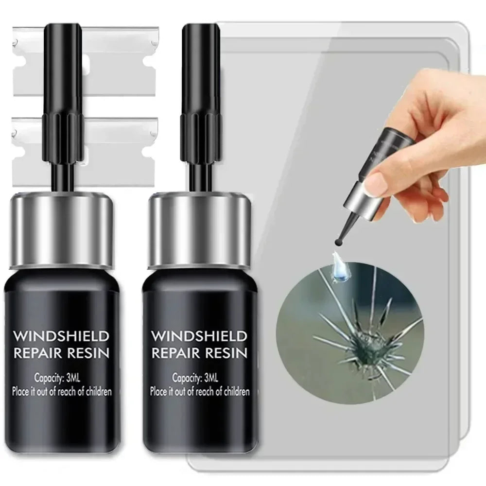 A set of Windshield Repair Resin bottles with droppers shown on a clear plastic tray.