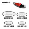 A set of Ford aluminum hood and trunk emblem badges in various sizes and finishes.