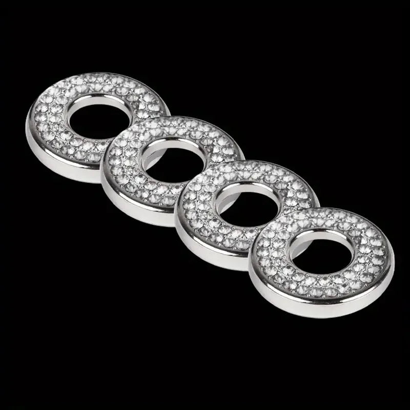 A set of five silver-toned, round, brilliant-cut diamond door lock pin trim rings arranged in a line.