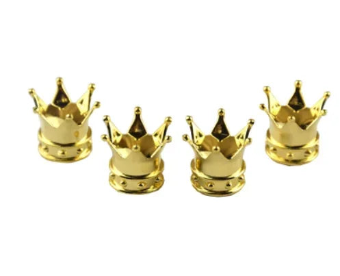 Quatre bouchons universels pour valves de voiture de couleur or, présentés individuellement.