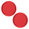 A set of red, hexagonal silicone coasters with a textured surface.