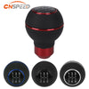 A black gear shift knob with red accents and four numbered positions is shown alongside three other black knobs.