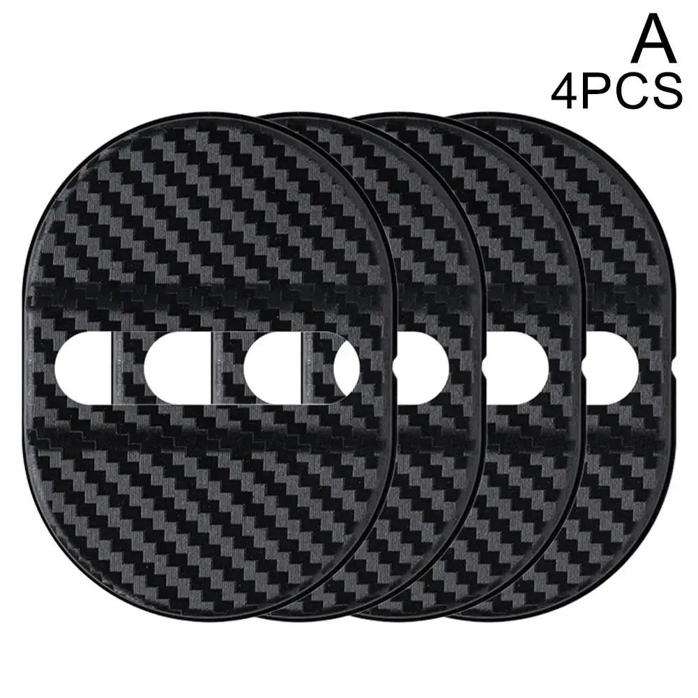 Four black carbon fiber textured door lock protective covers.