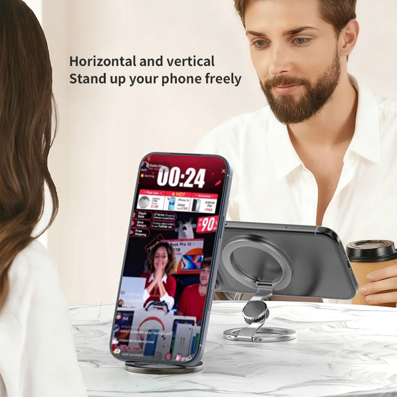 A hand holds a 360° magnetic phone ring stand with dual-sided grip, demonstrating how to hold a smartphone vertically.