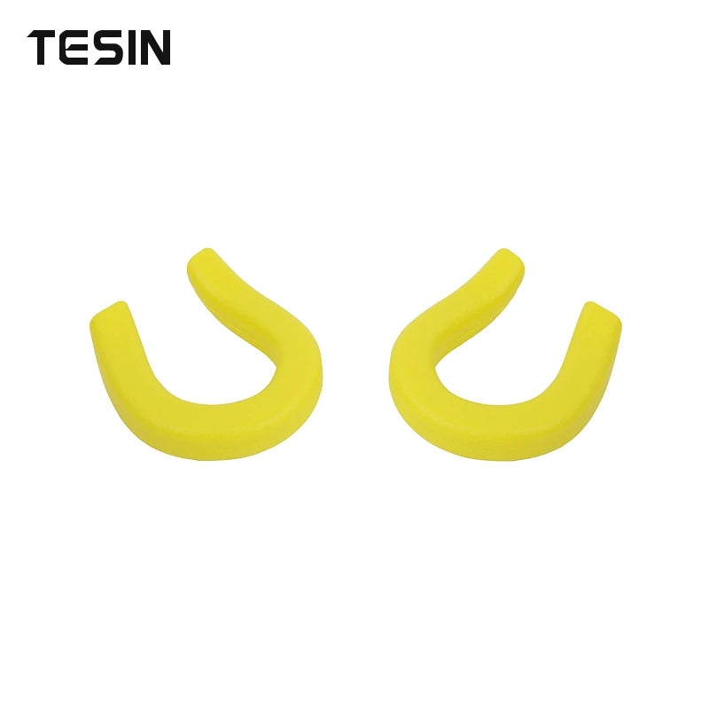 A pair of yellow universal car exterior bumper tow hook covers.