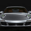 Silver Porsche 911 with an LED halo ring and dynamic lighting features.