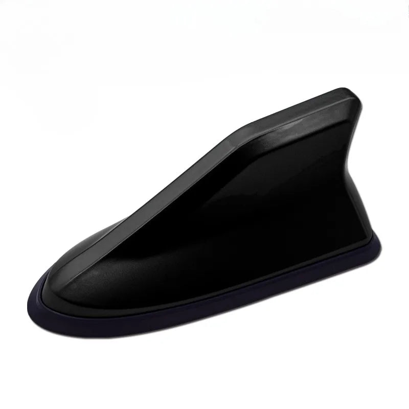 Black shark fin universal car antenna amplifier.