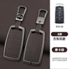 A pair of metallic car key cases with a lanyard, featuring a black design and a magnetic closure.
