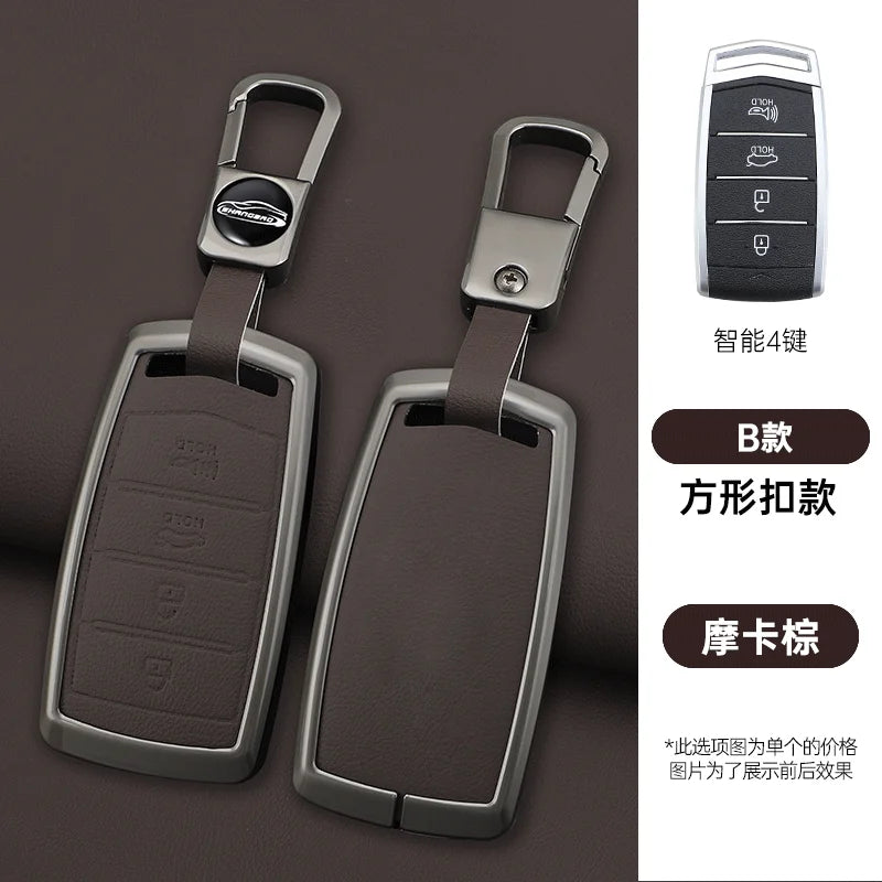 A pair of metallic car key cases with a lanyard, featuring a black design and a magnetic closure.