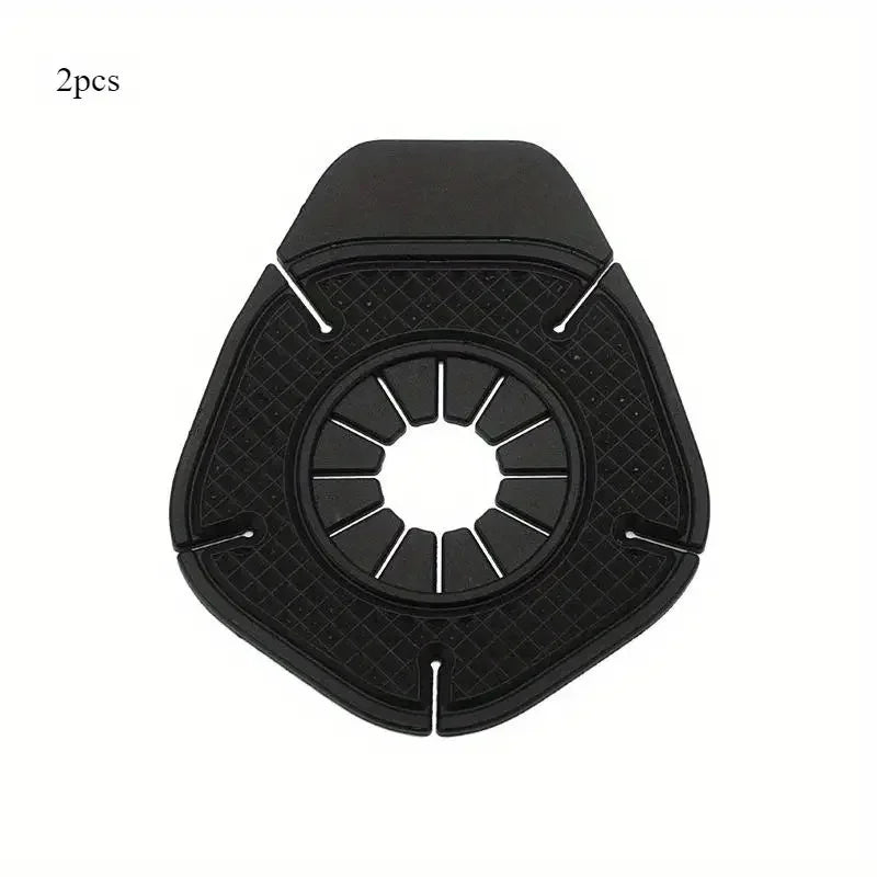 Two black anti-leak wiper arm hole covers with a central opening and surrounding slots.