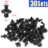 A pile of black 8mm plastic rivet fasteners for automotive and DIY projects.