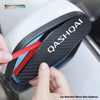 Carbon fiber rain guards for Nissan Qashqai side mirrors being installed.