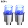 Two universal LED wheel lights for bikes and cars with silver bases