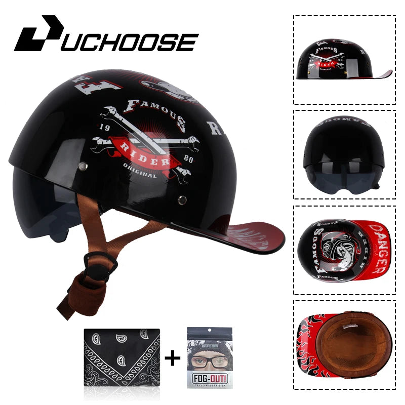 Black motorcycle helmet with famous rider graphics and a brown strap, shown next to accessories.