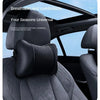 Black breathable and comfortable leather headrest and neck support cushion for a car seat.