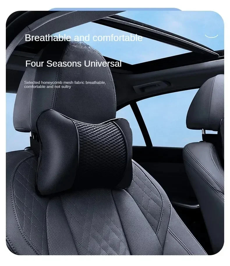 Black breathable and comfortable leather headrest and neck support cushion for a car seat.